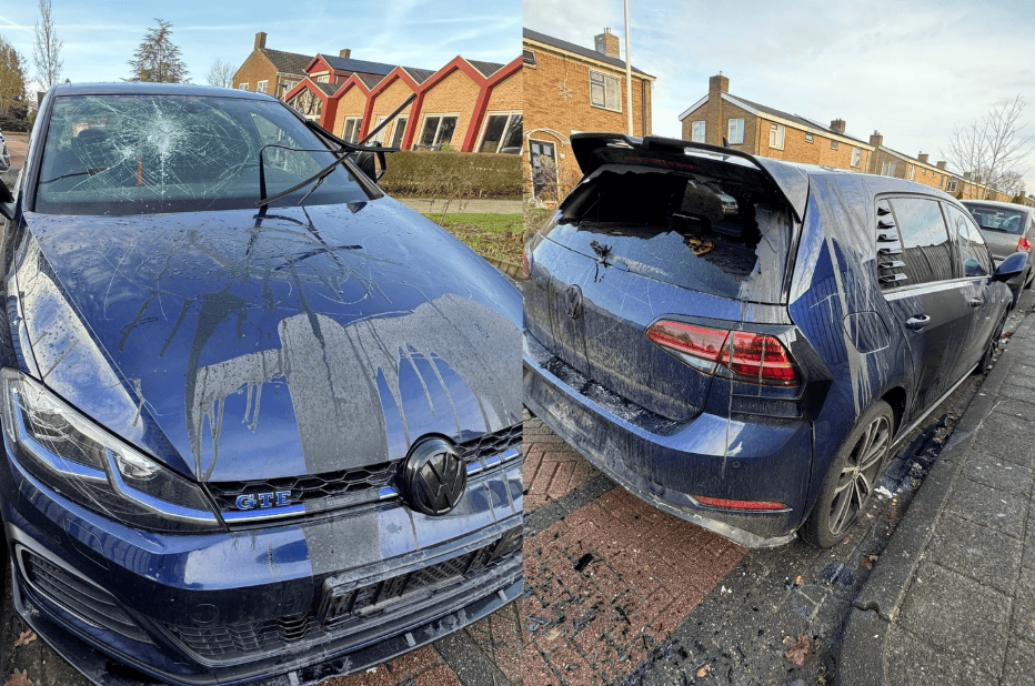 Auto volledig vernield en ruit van woning ingegooid aan de Lijnbaan in Leek